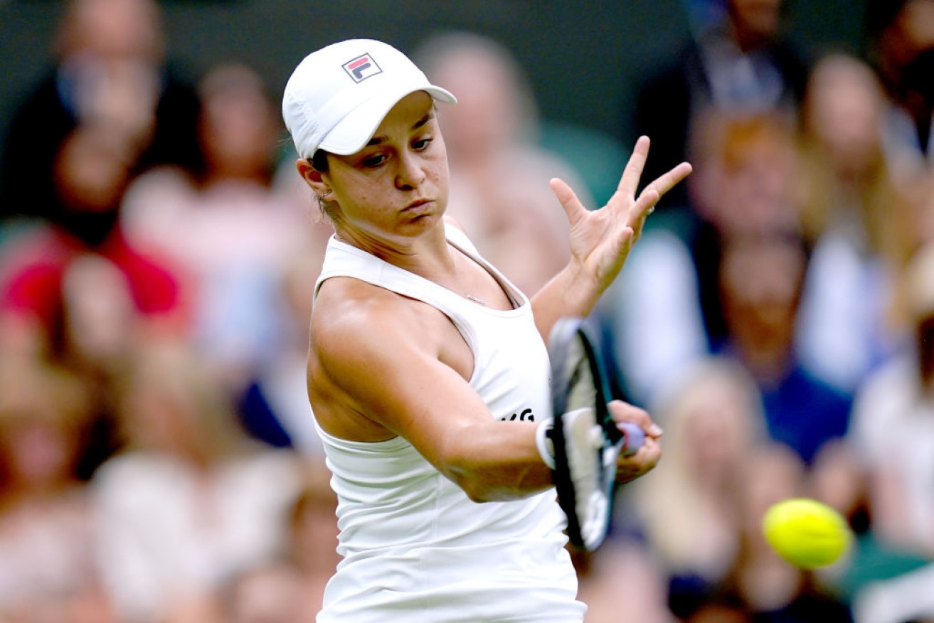 Ash Barty was cheered on by a full house at Wimbledon as she defeated Carla Suarez Navarro.
