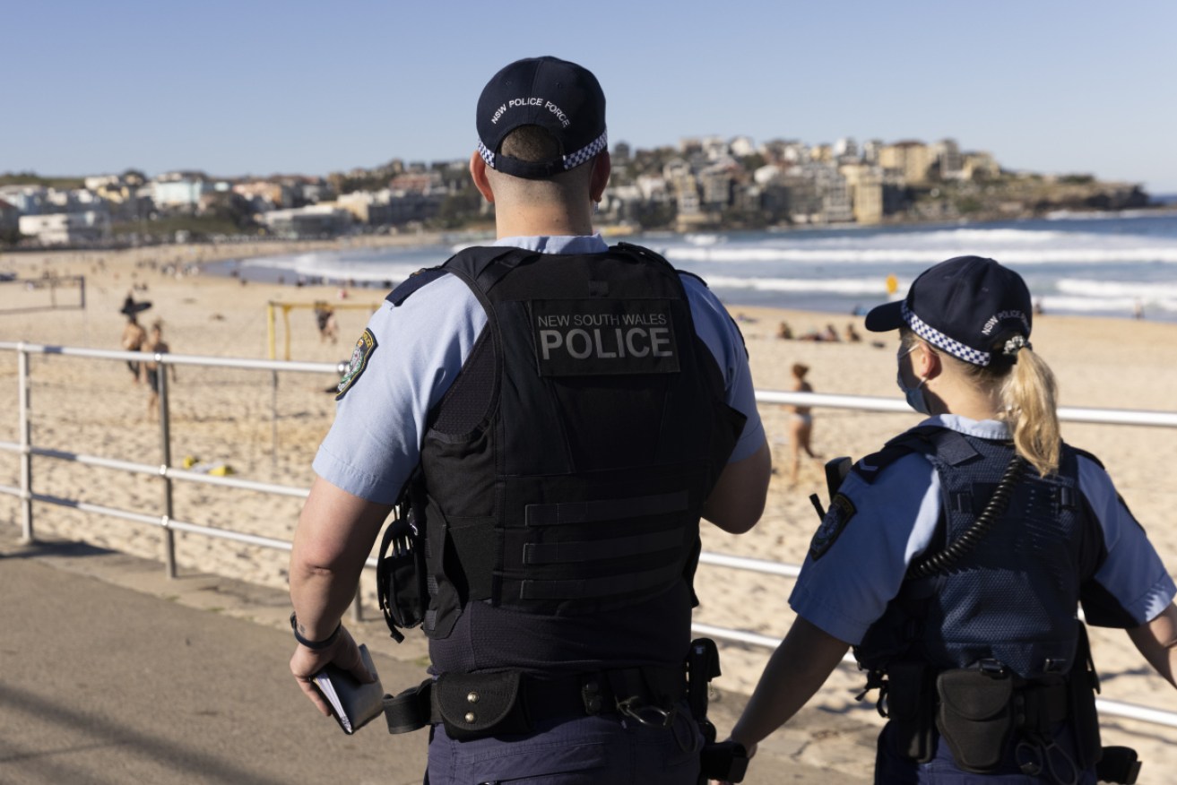 Police patrol Bondi Beach amid rising concerns about the number of people not following lockdown orders.