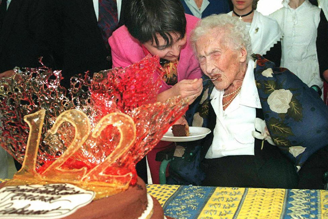 Jeanne Calment tastes her last birthday cake. She survived another 164 days. 