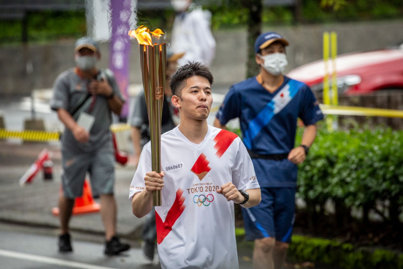 As the Olympic torch relay makes its way around Japan, much of the original route has been changed to avoid large gatherings.