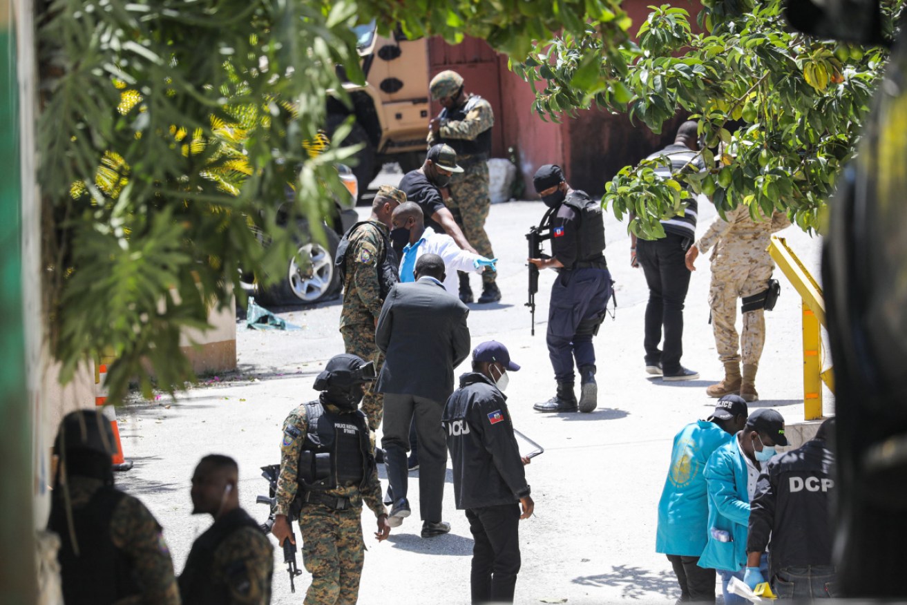 Members of the Haitian police force outside the presidential residence after Jovenel Moise's killing.