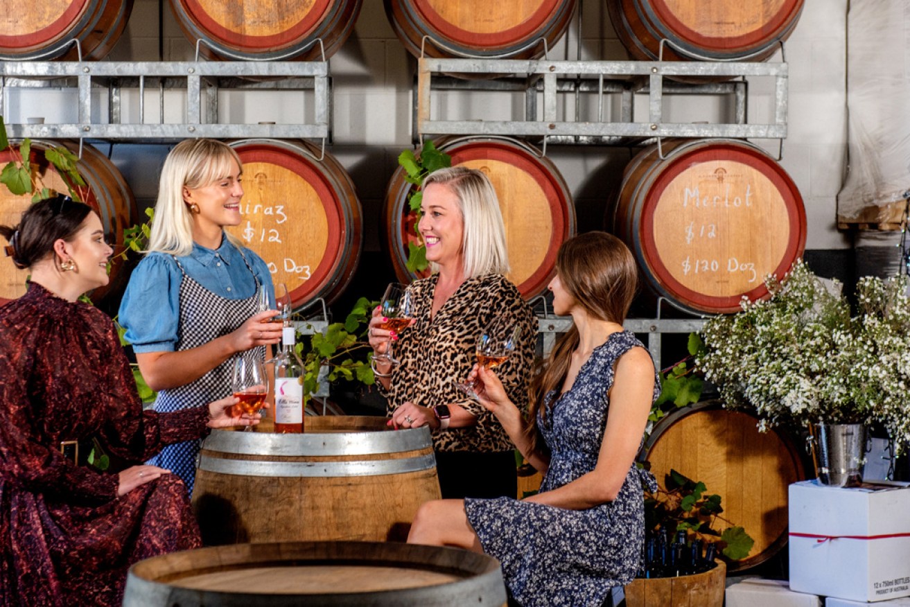 Wine among the barrels at Ellis Wines, featuring drops from the region.