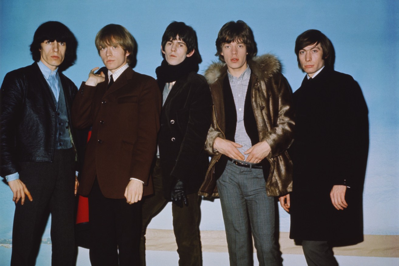 English rock and roll group the Rolling Stones posed in 1964.