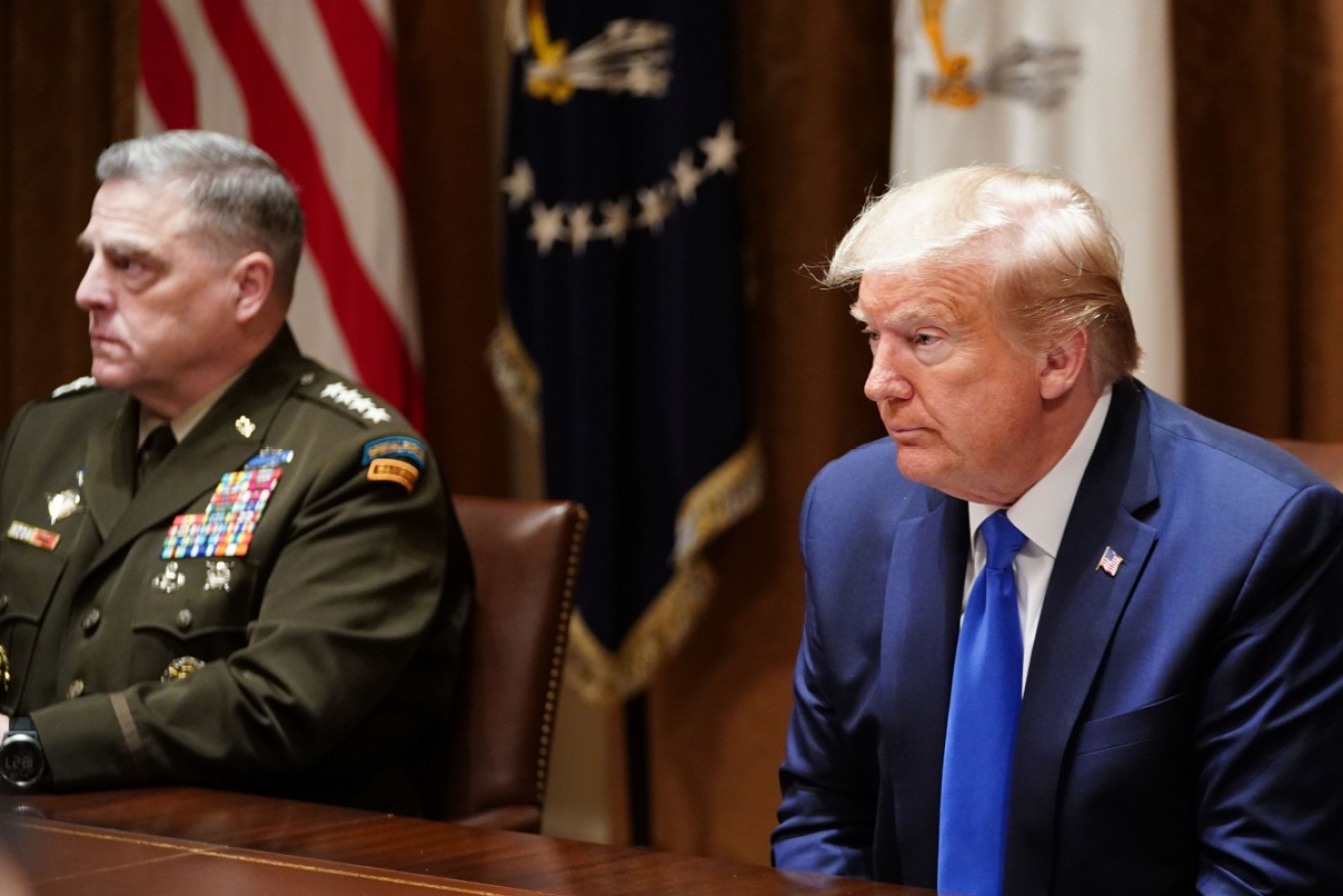 Donald Trump and General Milley at a meeting in the White House cabinet room in May 2020.