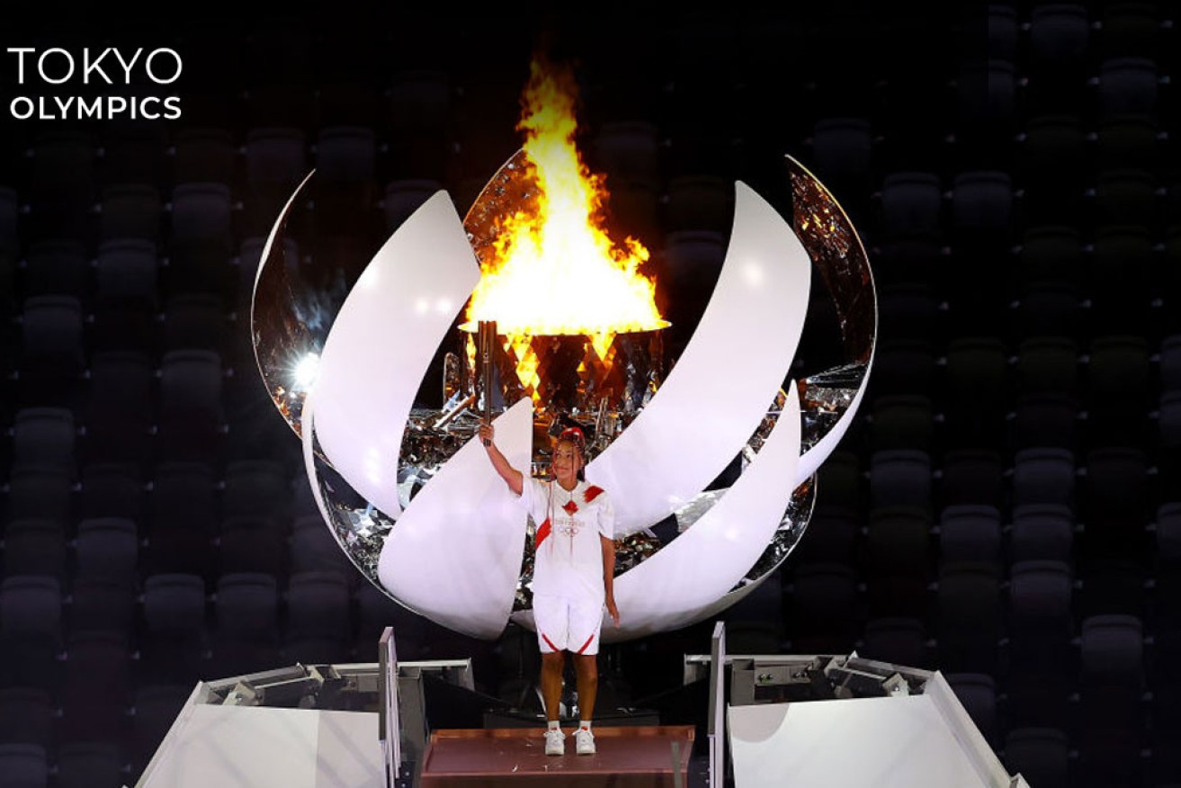 Naomi Osaka lights the cauldron that opened like a flower. 
