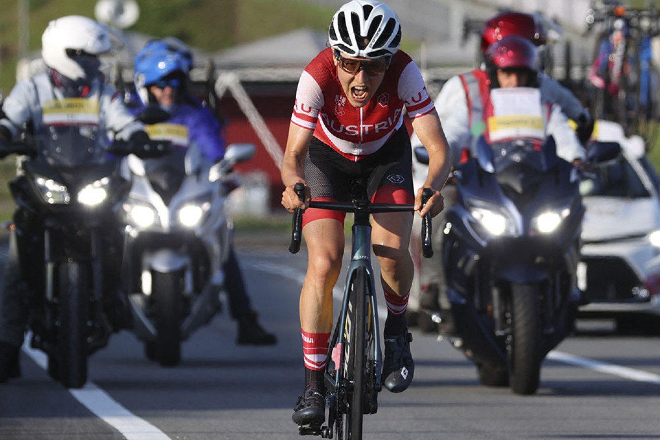 Austria's Anna Kiesenhofer leads in the women's cycling road race on Sunday. 