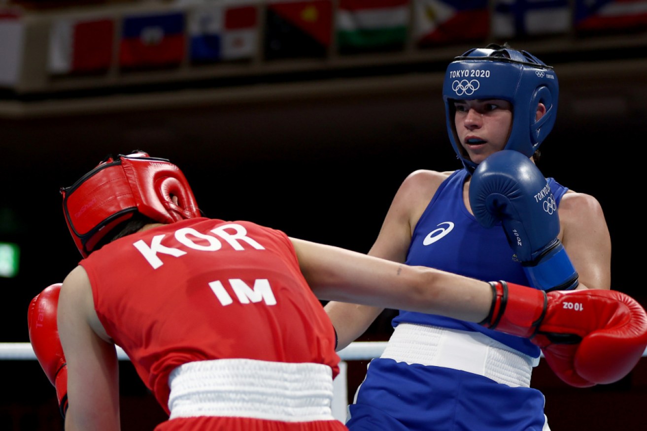 Australia's Skye Nicolson has punched and weaved her way into the featherweight division last eight.