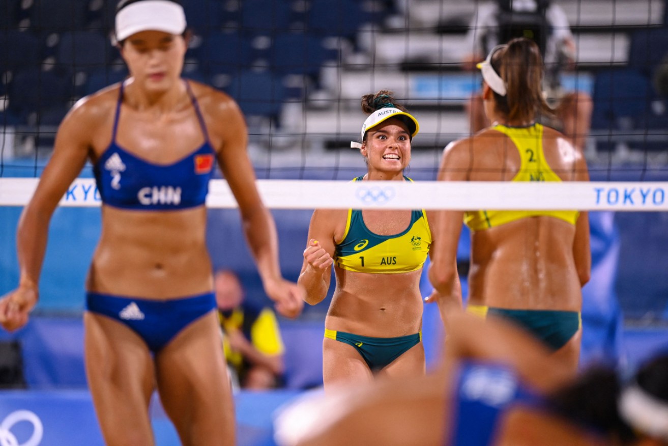 Mariafe Artacho del Solar gestures to Taliqua Clancy in their beach volleyball round of 16 match against China.