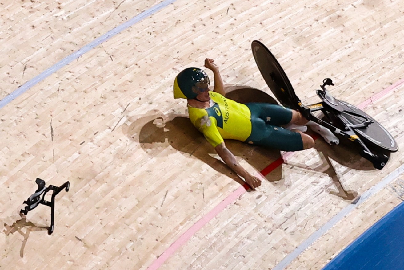 Australia's Alexander Porter is stunned after his fall in the men's team pursuit qualifying on Monday night. 