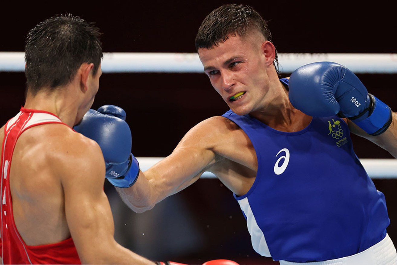 Harry Garside connects with Kazakhstan’s Zakir Safiullin in Tuesday night’s quarter final.