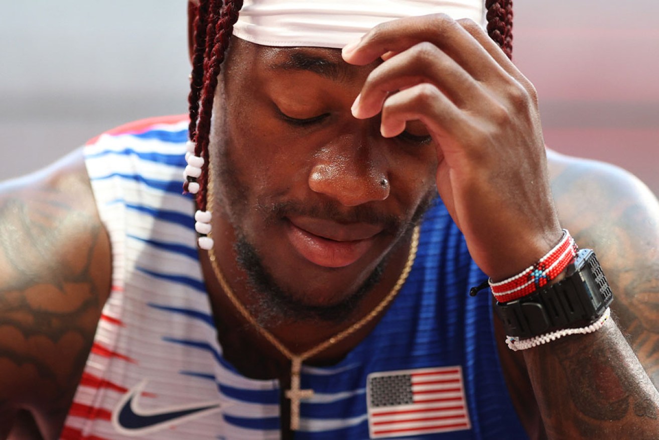 Cravon Gillespie of Team US reacts after coming in sixth in the men's 4x100m relay heats.