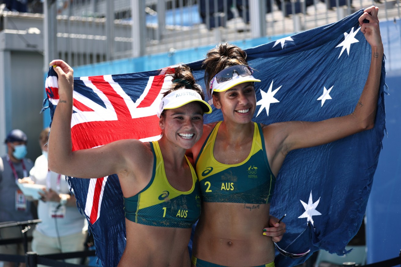 Taliqua Clancy (right) says she was inspired to beach volleyball silver by a video from Cathy Freeman. 