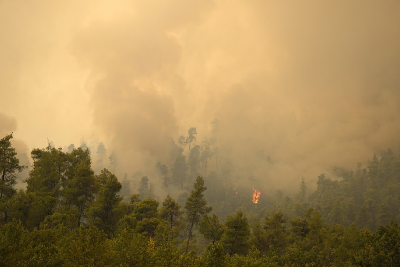 A UN report will raise the spectre of more fires, drought and floods if global warming continues.