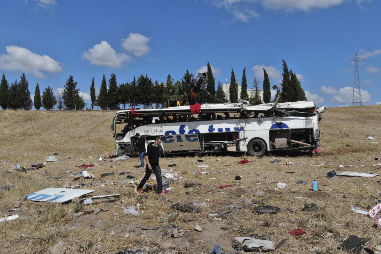 A passenger bus has tumbled off a highway in western Turkey, killing 15 people.