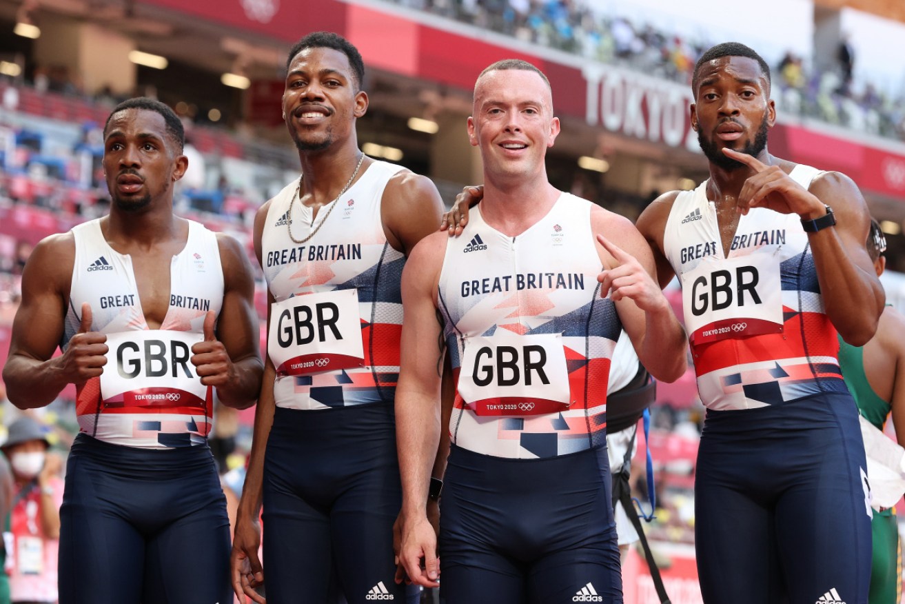 Chijindu Ujah (left) with other members of Britain's silver medal-winning relay team.