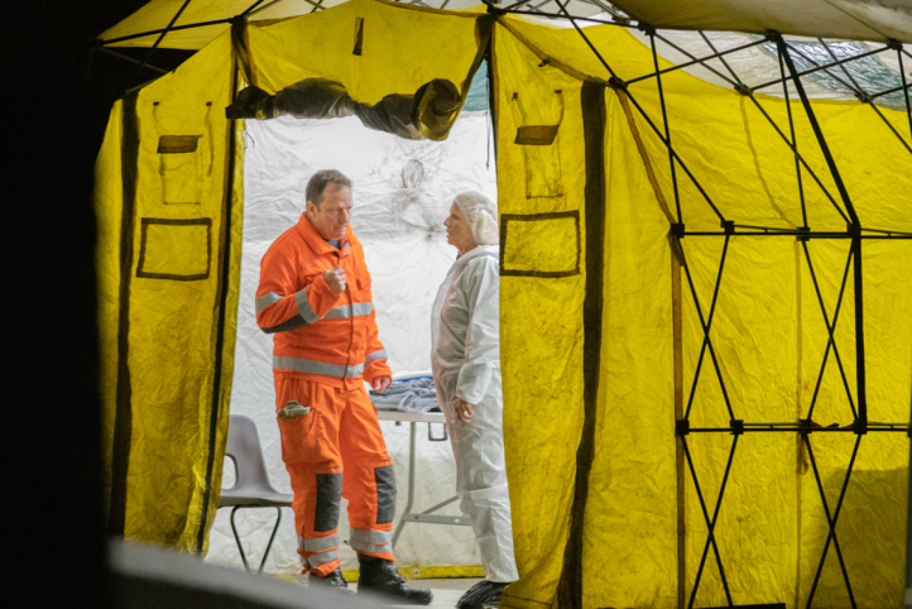 Forensics experts work the scene of the bloody Plymouth rampage.