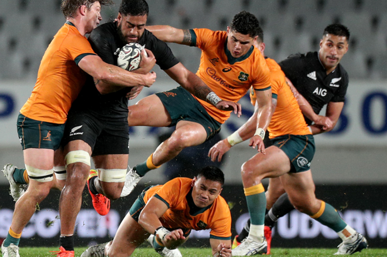 Akira Ioane of New Zealand needed more than Captain Michael Hooper's tackle to slow him down.