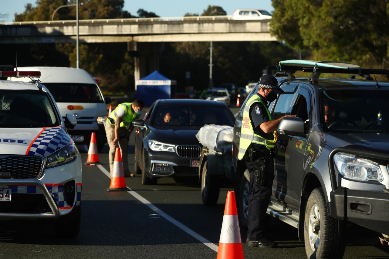 Queensland is further bolstering its hard border, with another 50 police sent to checkpoints.