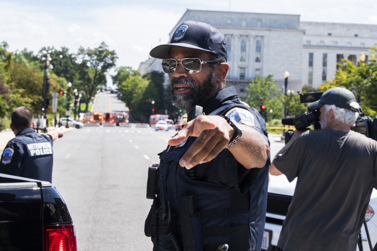 A Metropolitan Police officer at the standoff in Washington on Thursday.