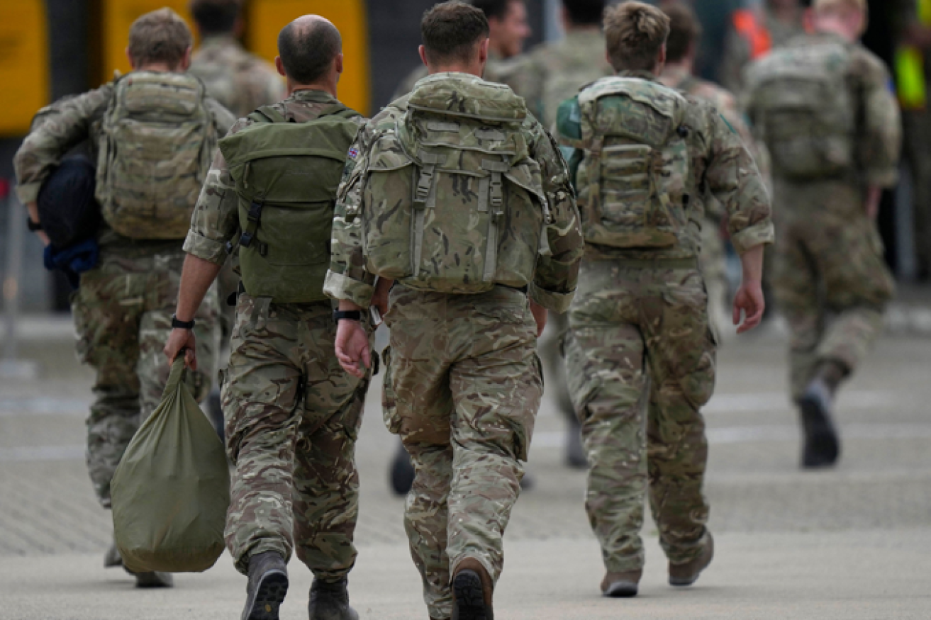 British special forces head for home after protecting the last evacuees in Kabul.