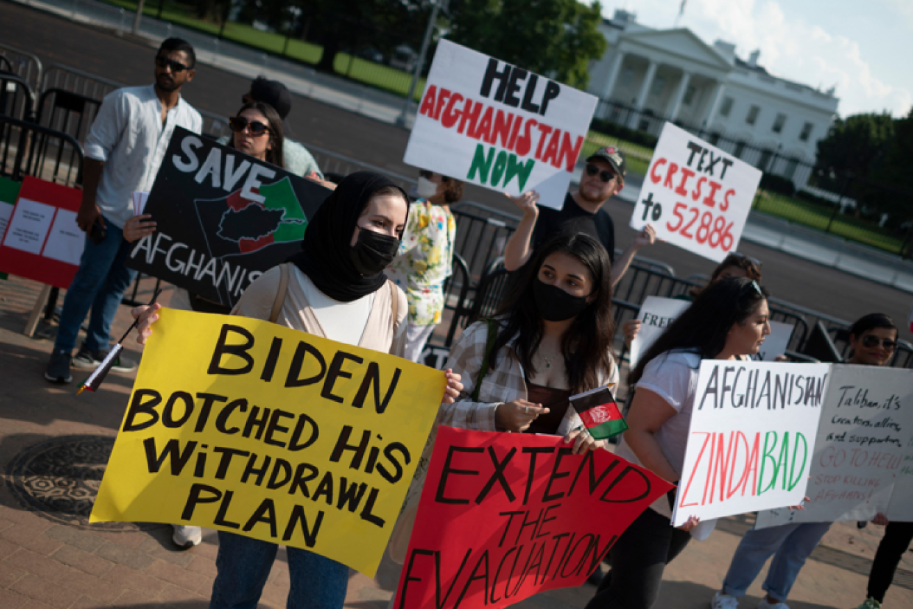 Protesters outside the White House voice their contempt for President Biden's handling of the Afghanistan crisis.