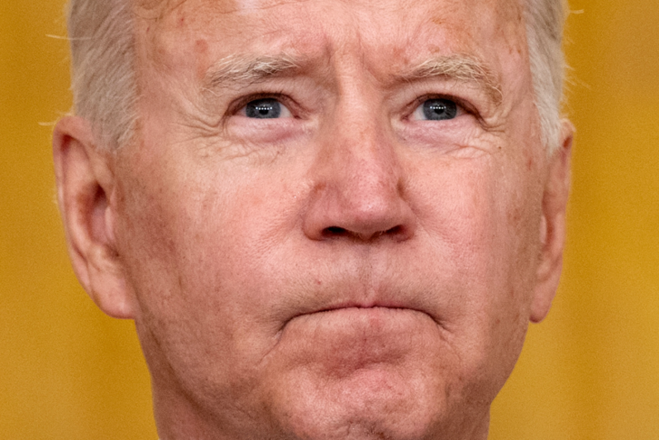 A grim Joe Biden says that he will show no ISIS as fears grow of another suicide attack on US troops.