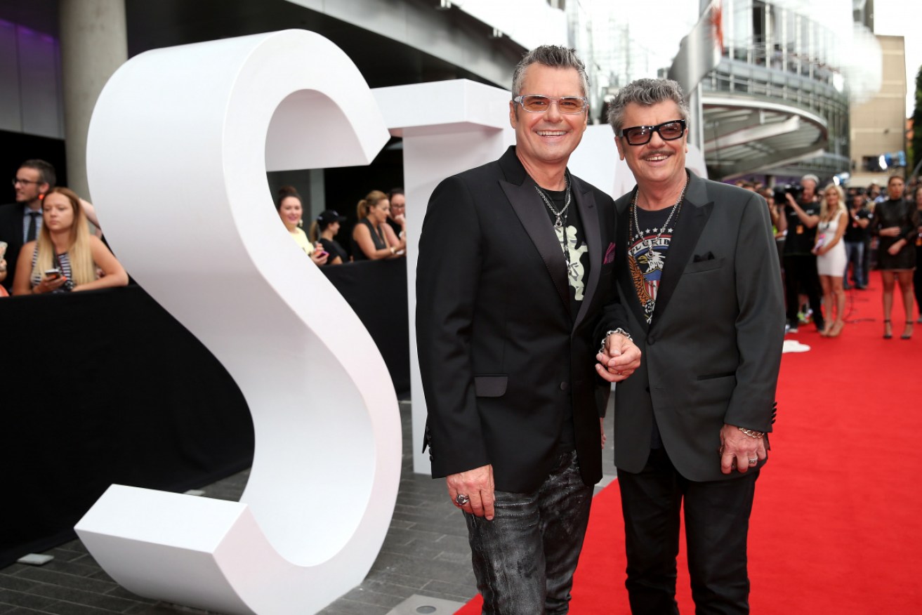 Tim Farriss with brother Jon at the 2014 Aria awards in Sydney.