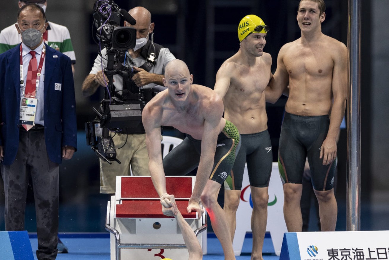Australia's men's 4x100m freestyle combination has broken the world record in winning Tokyo gold.