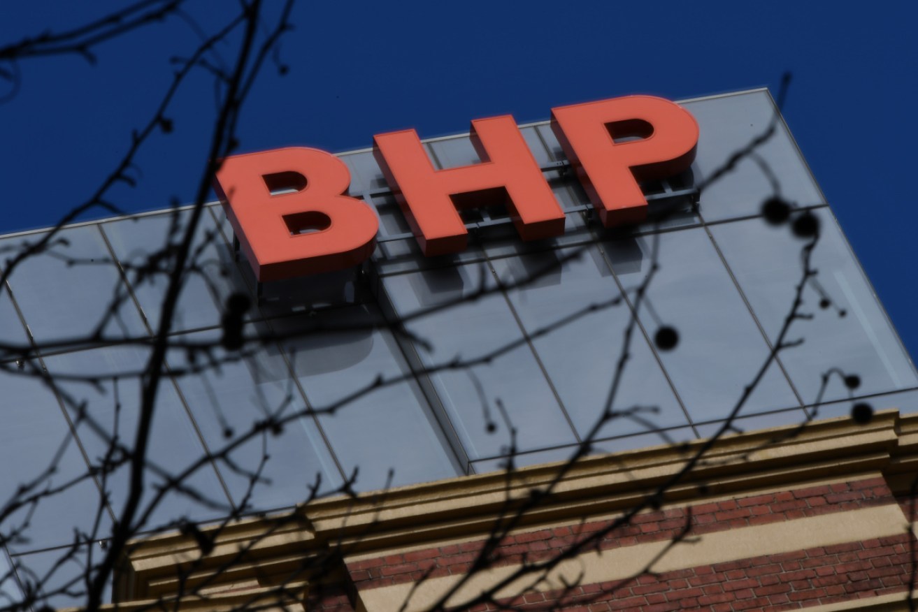 BHP has posted annual production records at Western Australia iron ore, Olympic Dam and Spence.