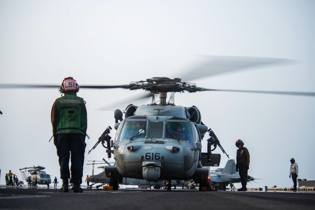 The MH-60S typically carries four people, although it is not known how many were on board the one that crashed into the sea.