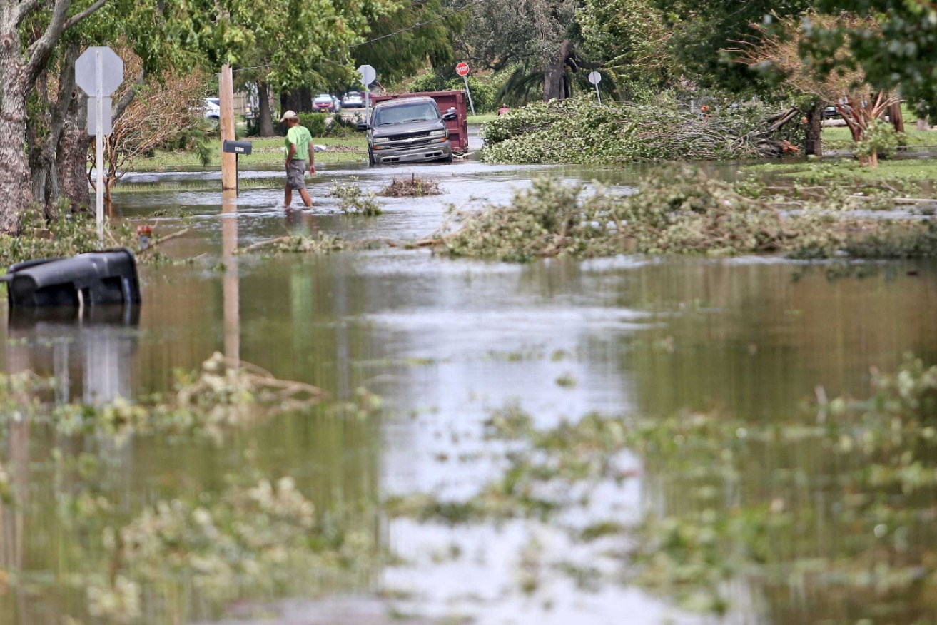 Damage in New Orleans from Hurricane Ida, which has killed at least four people.