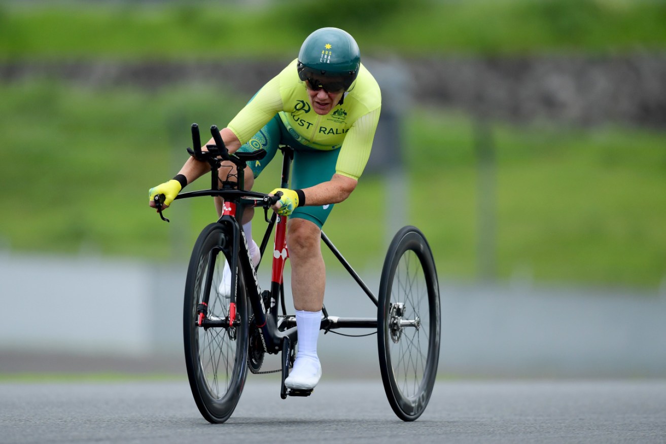 Australian Paralympics star Carol Cooke was taken to hospital after a crash in the T1-2 road race.