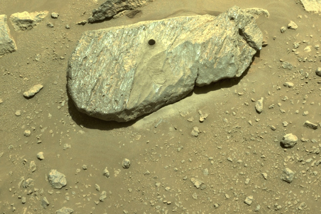 The rover collected its sample after drilling a hole in this Mars rock.