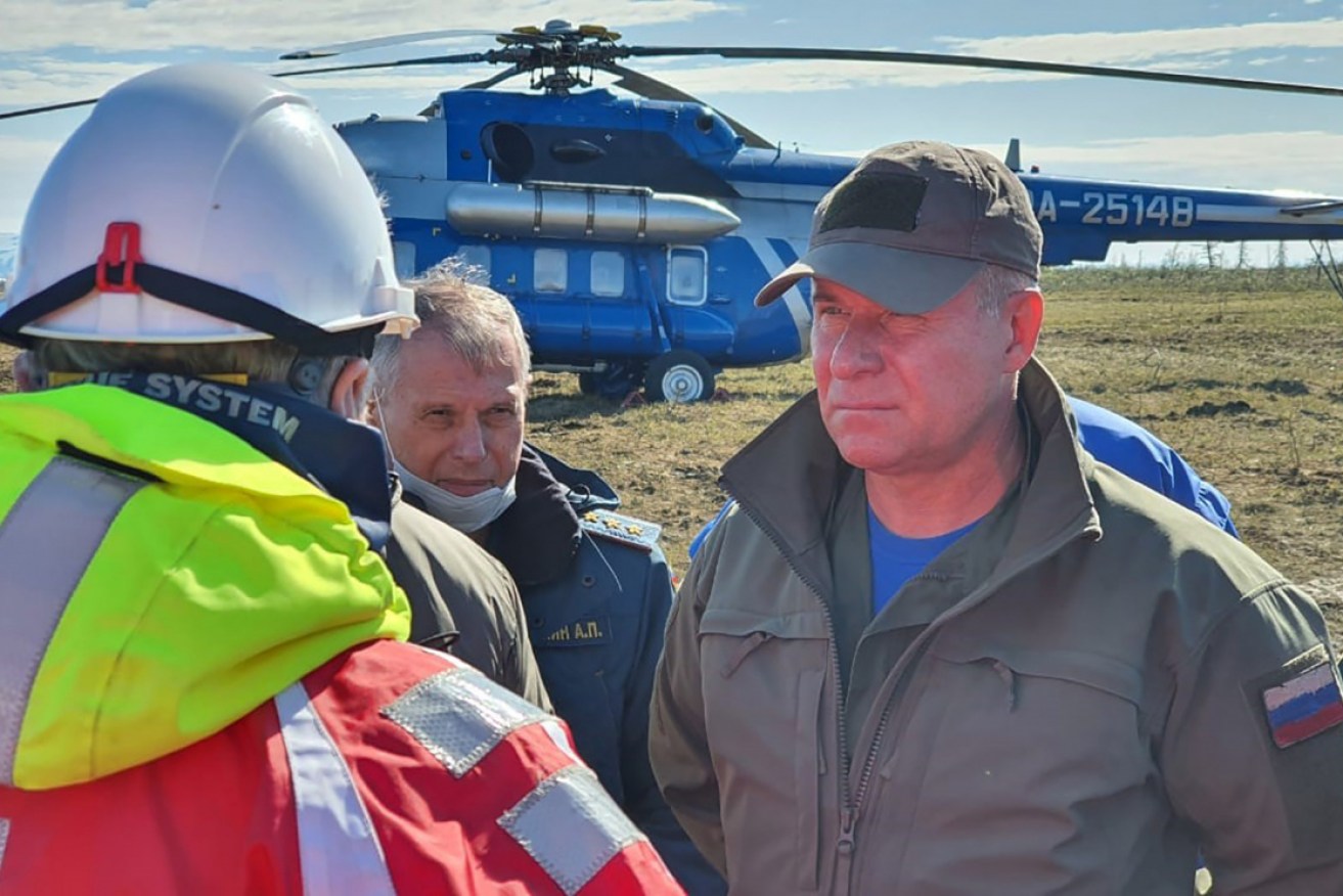 Mr Zinichev (right) at the scene of a diesel spill in 2020.