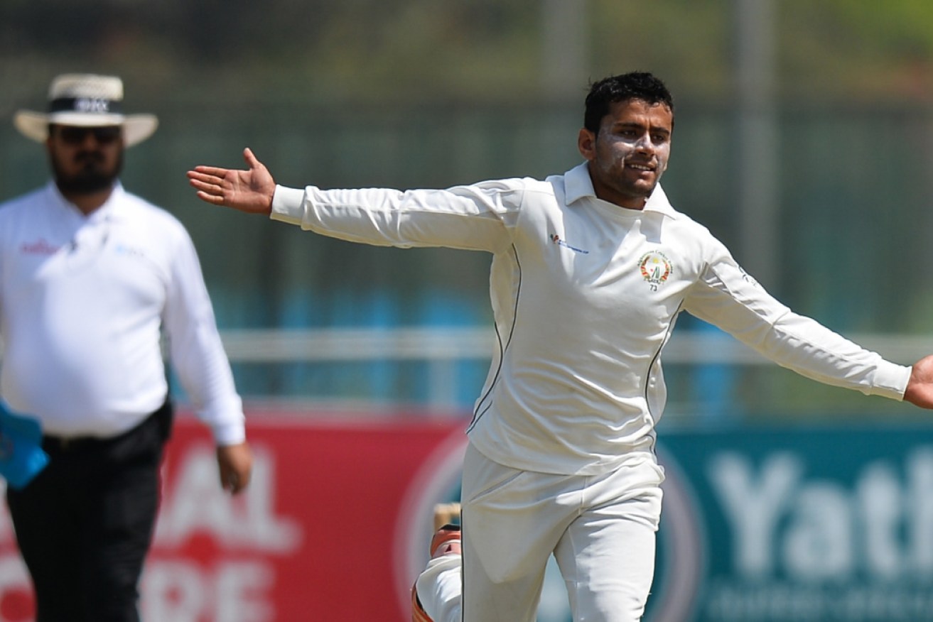 Afghanistan bowler Zahir Khan celebrates a wicket against Namibia. Afghanistan's looming Test against Australia is in doubt.