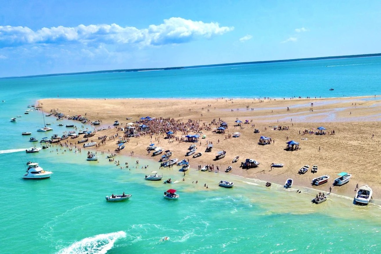 600 people were evacuated from a Darwin sandbar after tides washed out a day party.