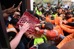 Tradies storm union offices in furious protest