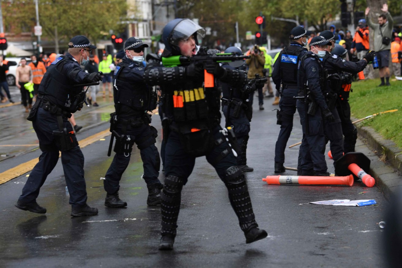 Police in riot gear have confronted protesters at the Melbourne headquarters of the CFMEU. 