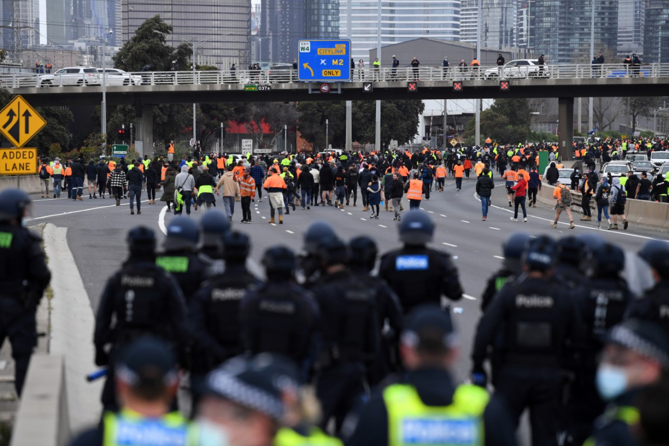 Protesters block traffic in Melbourne.