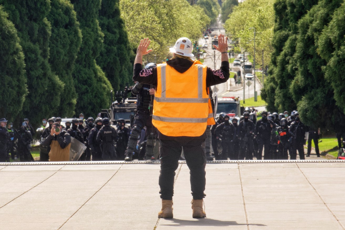 A man who attended the anti-lockdown protest in Melbourne's CBD on Wednesday is among the 733 COVID cases recorded in Victoria.