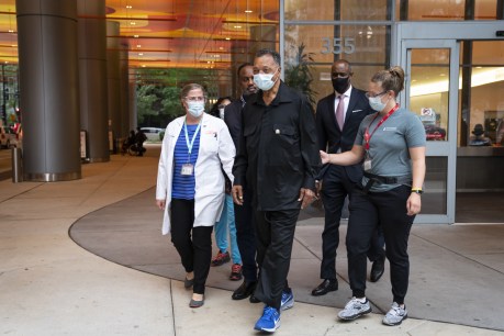 Jesse Jackson returns after COVID recovery