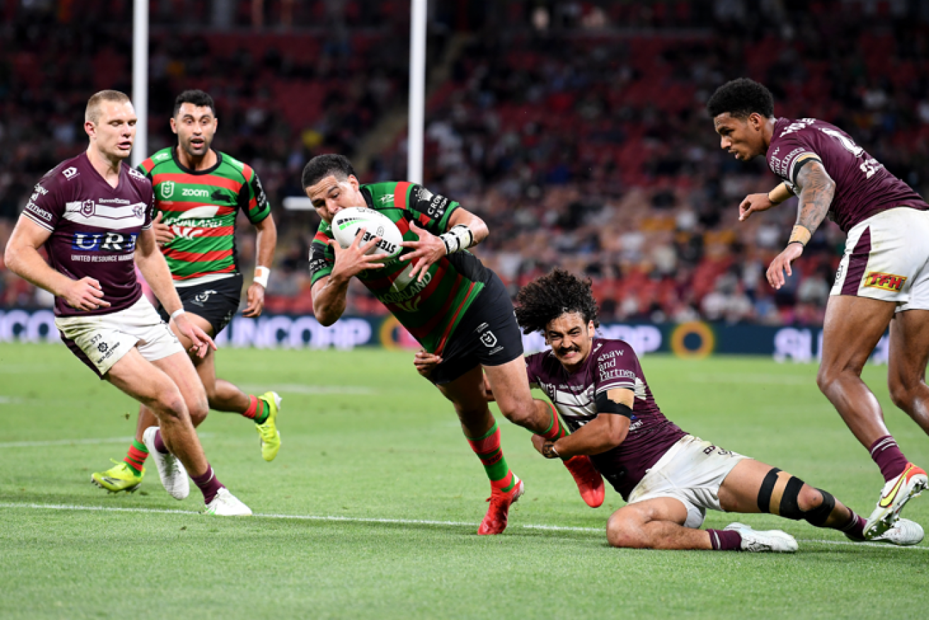 Cody Walker encounters some resistance - but not enough to foil the South Sydney's grand final berth.