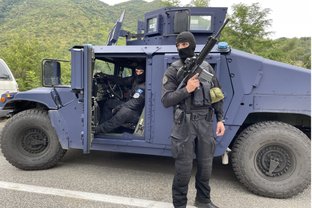 A Kosovo security unit trooper guards the border with Serbia as the Balkan nations trade accusations.