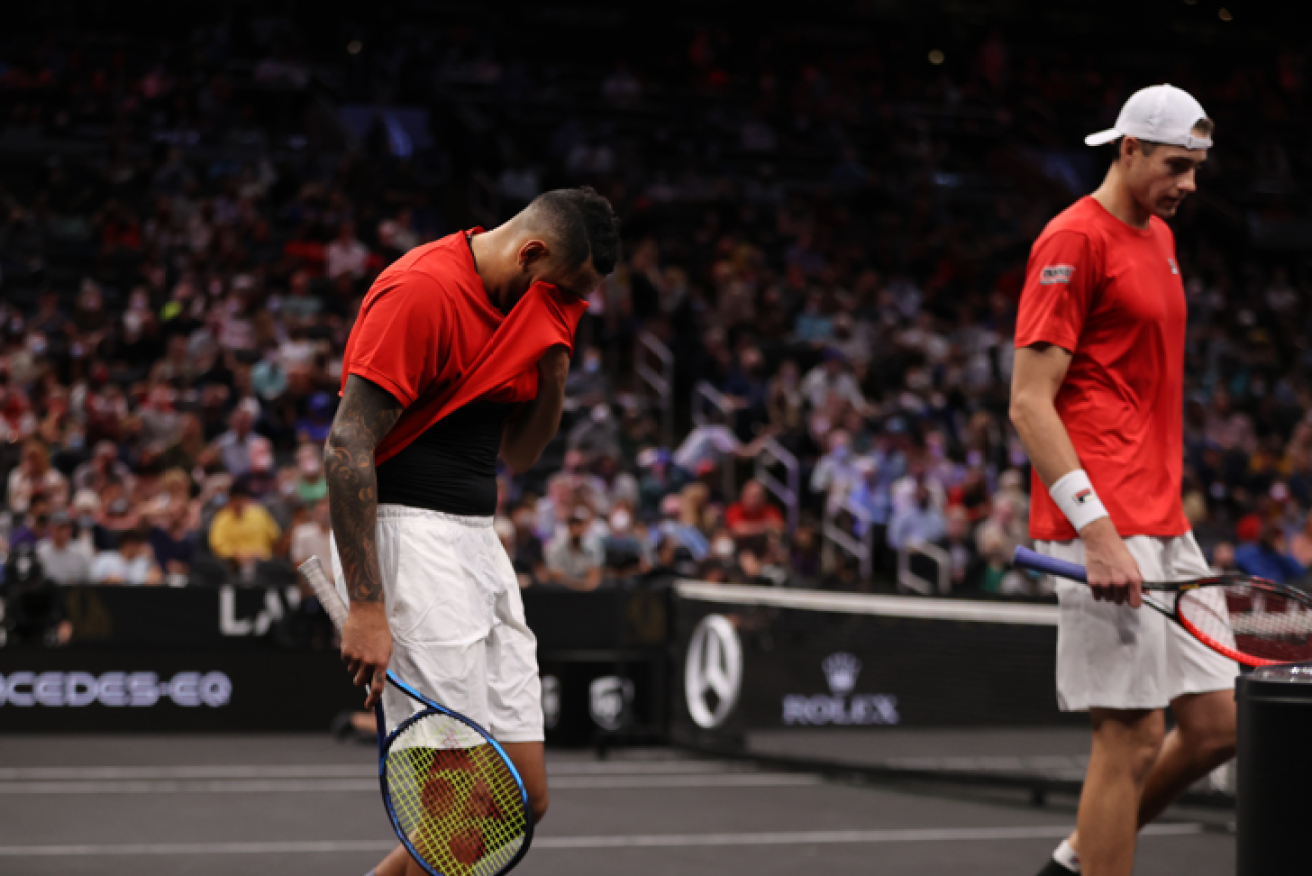 Nick Kyrgios buries his face after a losing performance at the Laver Cup event in Boston.