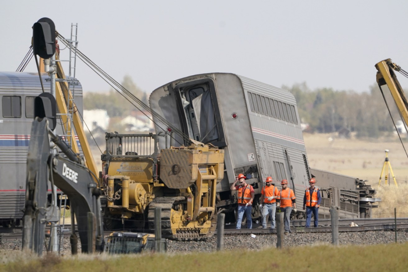 Investigators are onsite and recovery work underway following a deadly train derailment in the US.