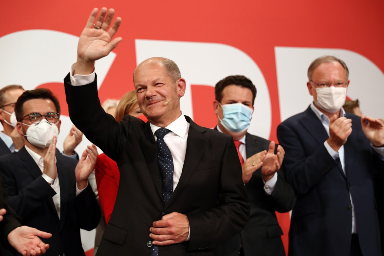 The Social Democrats of Olaf Scholz (centre) have won 25.9 per cent of vote in Germany's election