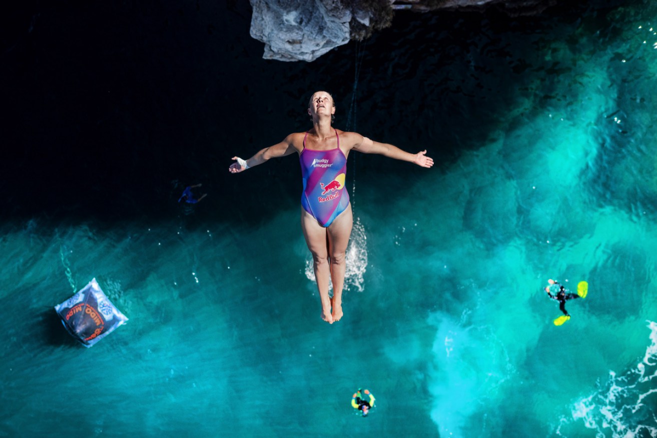 Rhiannan Iffland of Australia dives from the 21.5-metre platform in Polignano a Mare in Italy. 