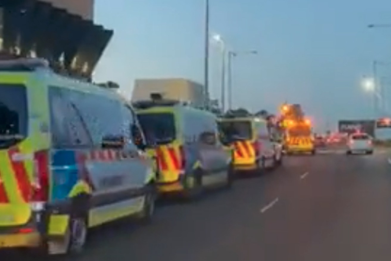 Ambulances wait outside Melbourne's busy Northern Hospital on Monday.