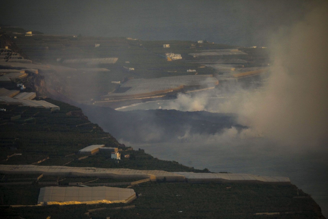 The lava peninsula of the Cumbre Vieja volcano as it reaches the Atlantic Ocean.