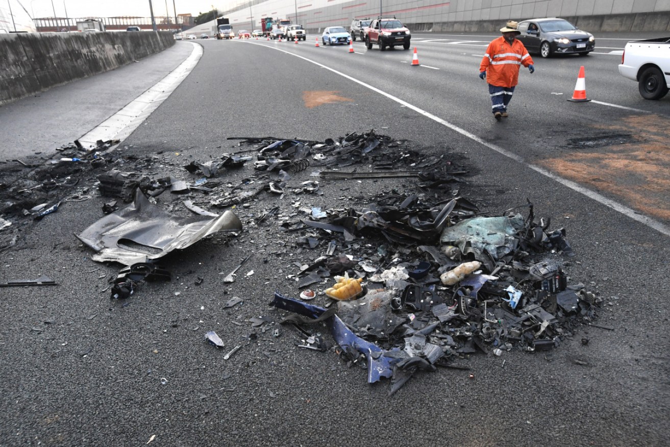 Debris on the motorway after the accident, which killed four people.